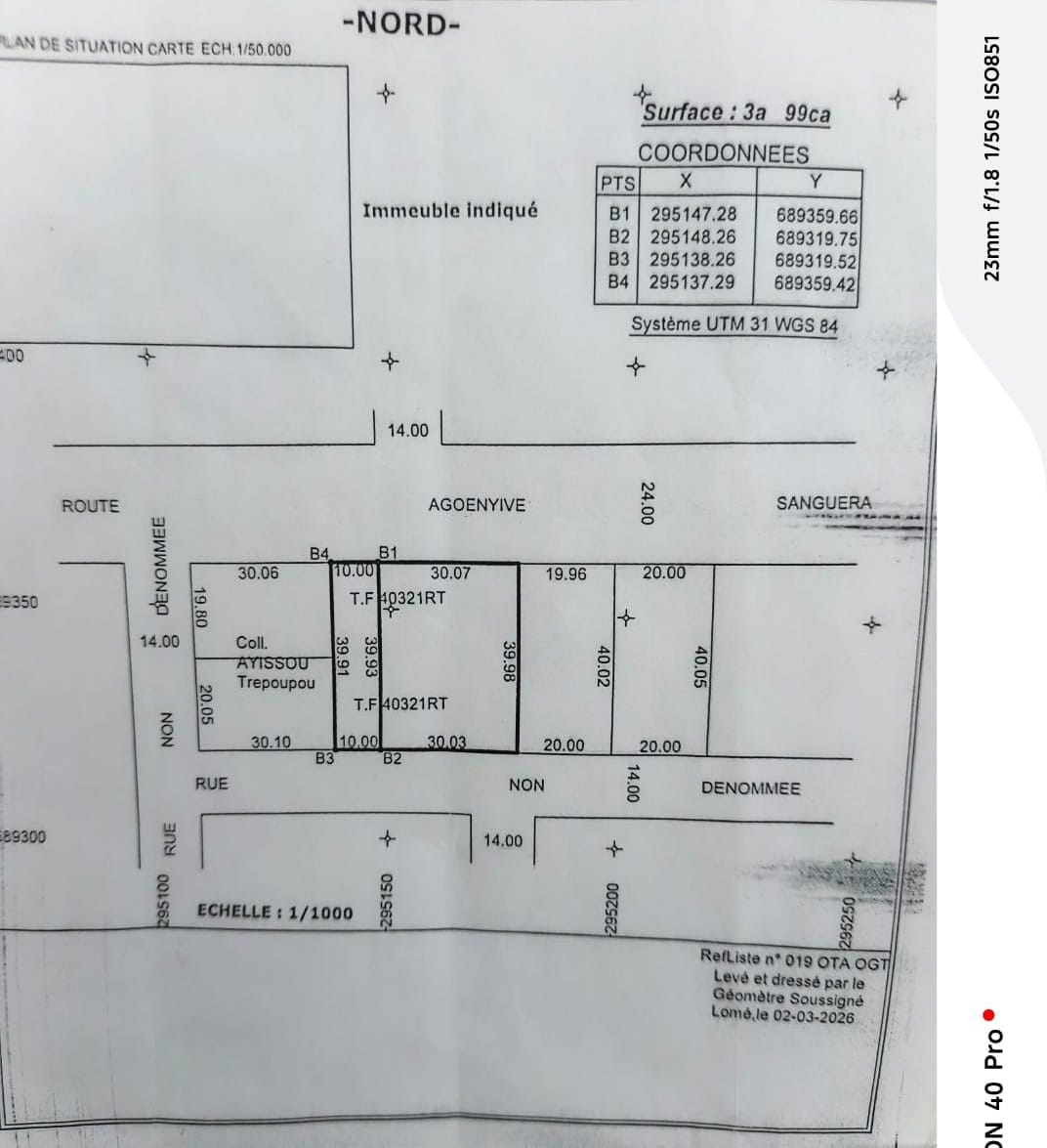 Terrain de 399 m² avec bâtiment en construction à vendre à Agoè Zossimé – 30 millions FCFA