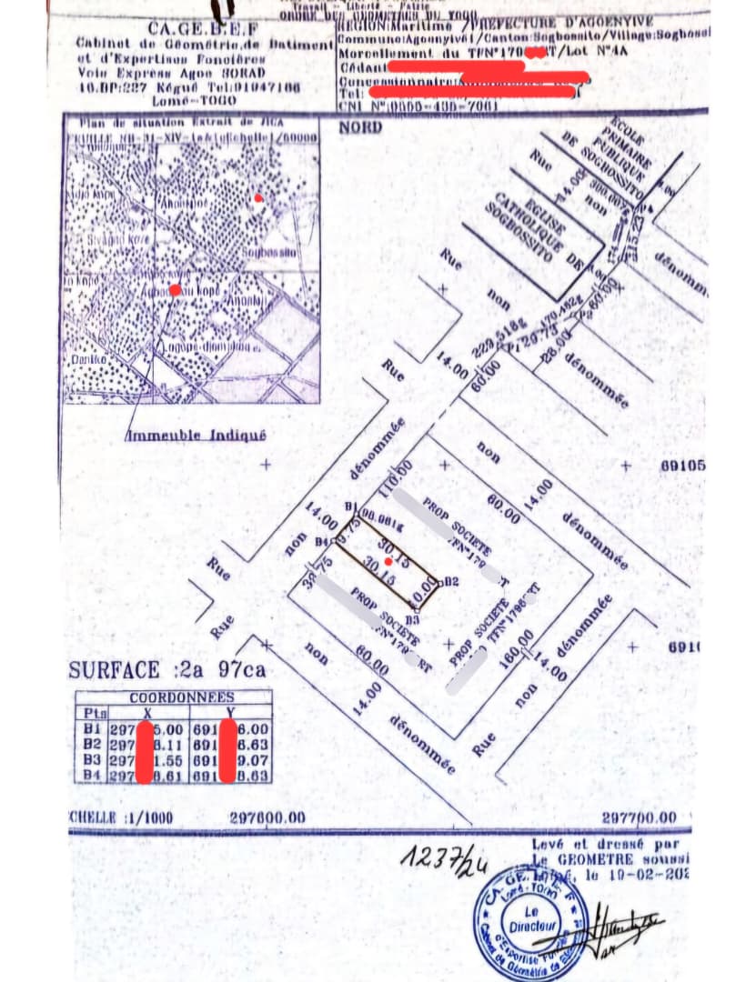 Terrain d'un demi-lot clôturé en vente à Sogbossito derrière l'église catholique – 15 000 000 FCFA
