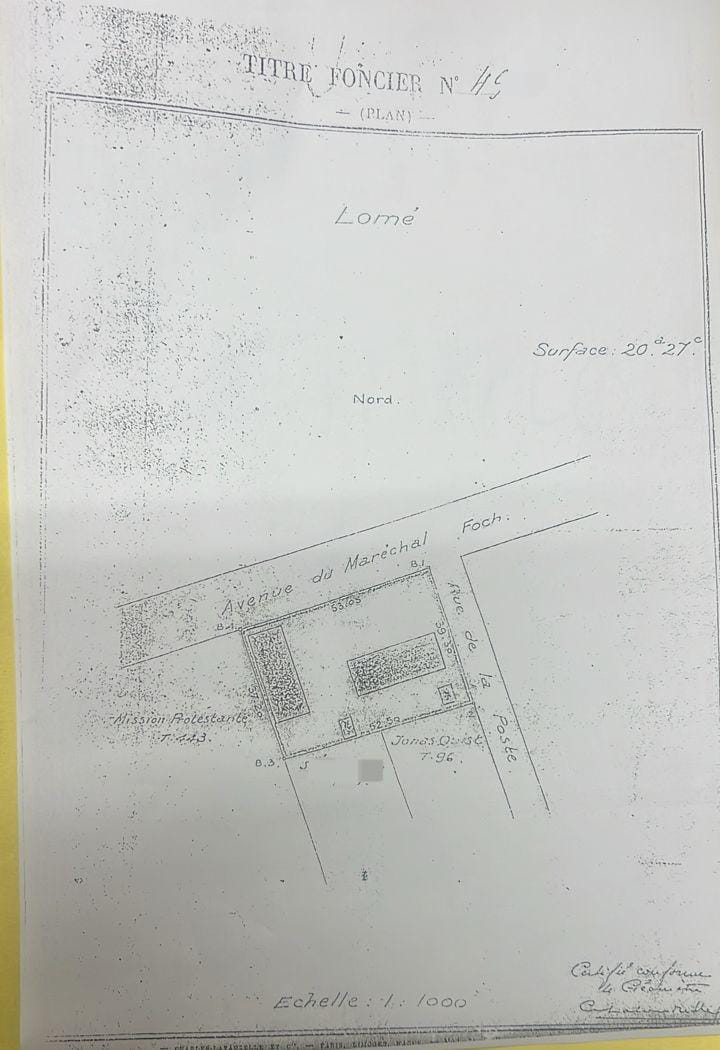 Terrain de 2027 m² en vente au Grand Marché de Lomé – 800 millions FCFA le lot