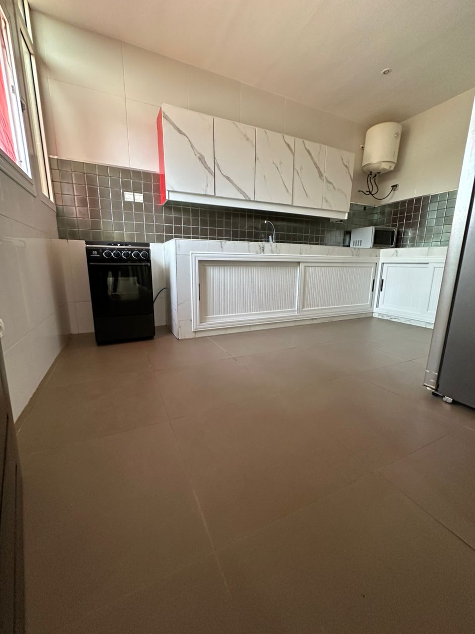 Villa triplex 4 chambres avec piscine en vente à Baguida – 280 millions FCFA