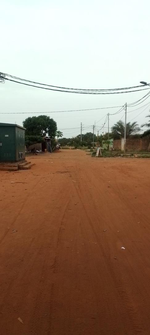 Terrain d'un demi lot en vente à Agoé Sogbossito à 100 m du goudron – 15 millions FCFA