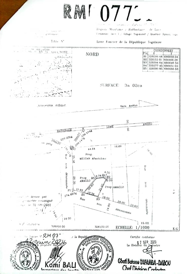 Terrain d'un demi-lot en vente à Togokomé côté plage, à 60m du goudron – 12 millions FCFA
