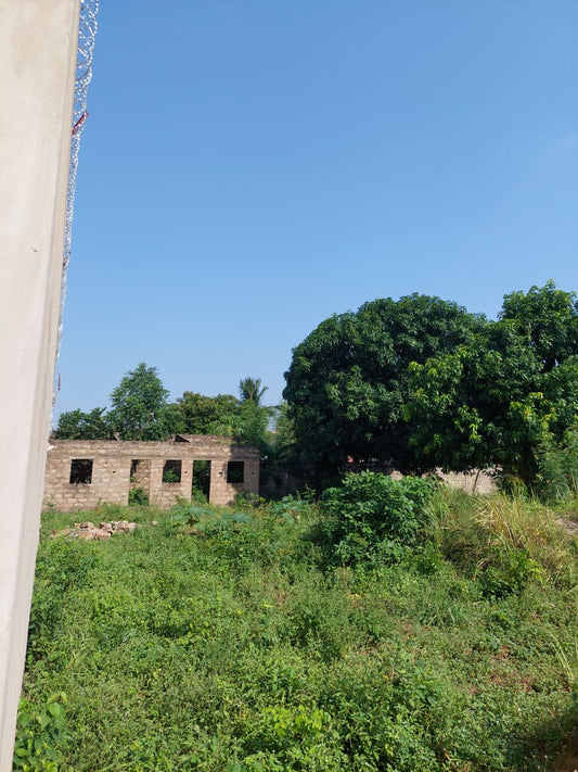 Demi lot de terrain en vente à Agoè Legbassito – 9 millions FCFA
