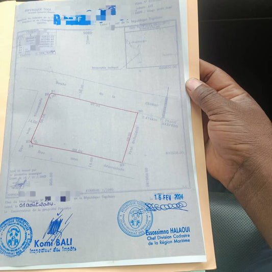 10 lots terrain en vente en bord du goudron à Aképé – 25 millions FCFA le lot