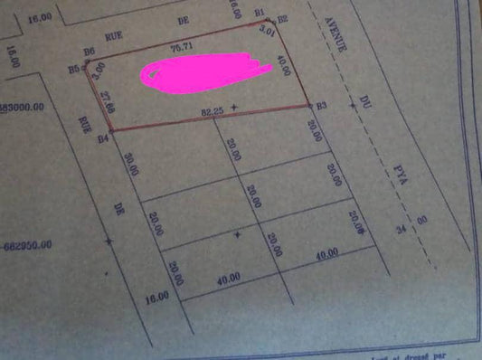 Terrain de 4 lots et demi en vente à Djidjolé-Adidoadin – 450 millions FCFA