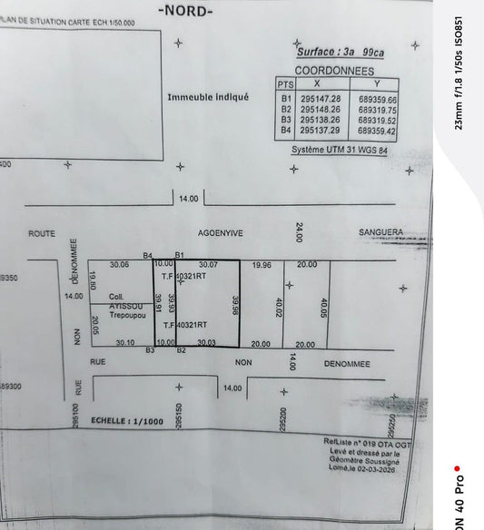 Terrain de 399 m² avec bâtiment en construction à vendre à Agoè Zossimé – 30 millions FCFA