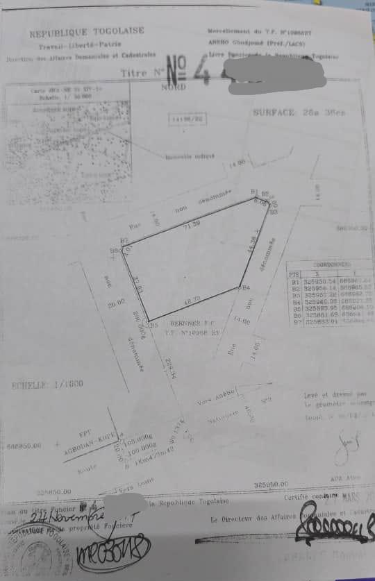 Terrain de 2700 m² en vente à Gbodjomé, 200 m du goudron RN2 – 130 millions FCFA
