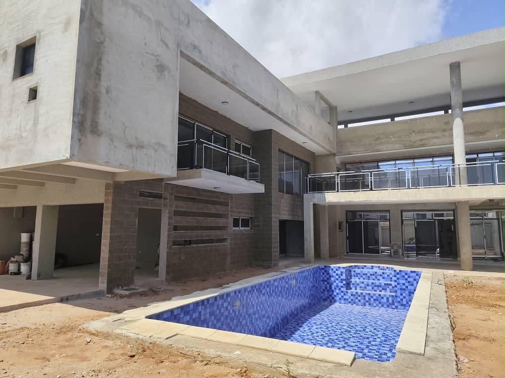 Villa 4 chambres en vente à Lomé Cité Oua (Caisse) – 1.5 milliard FCFA