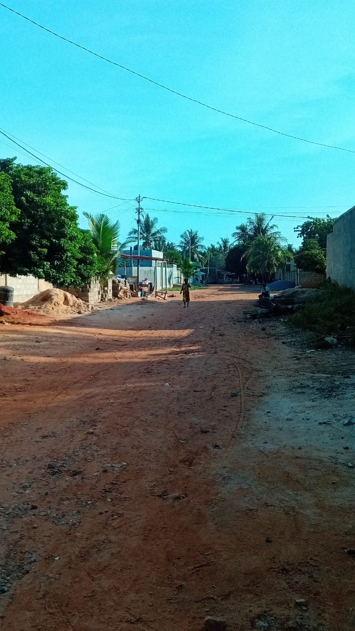 Demi lot de terrain cloturé à vendre à Agoe Sogbossito non loin du bar izis – 15 000 000 FCFA