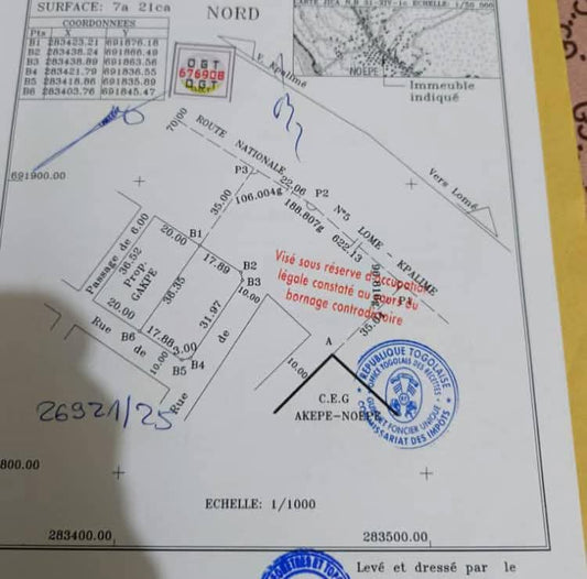 Terrain d'un lot un quart en vente au bord du goudron à Noépé – 45 millions FCFA